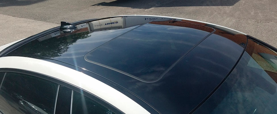 Оклейка крыши пленкой черный глянец